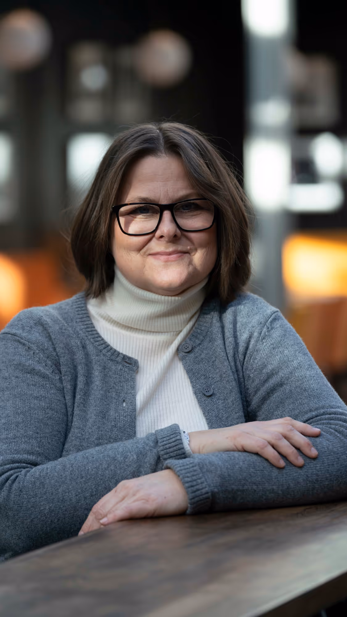 A picture of costume designer Jeanette Gjestvang in front of a blurry background